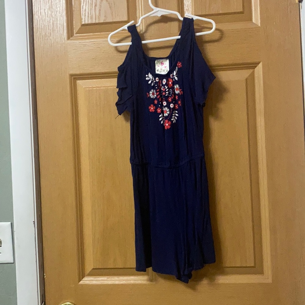 Blue romper with flowers